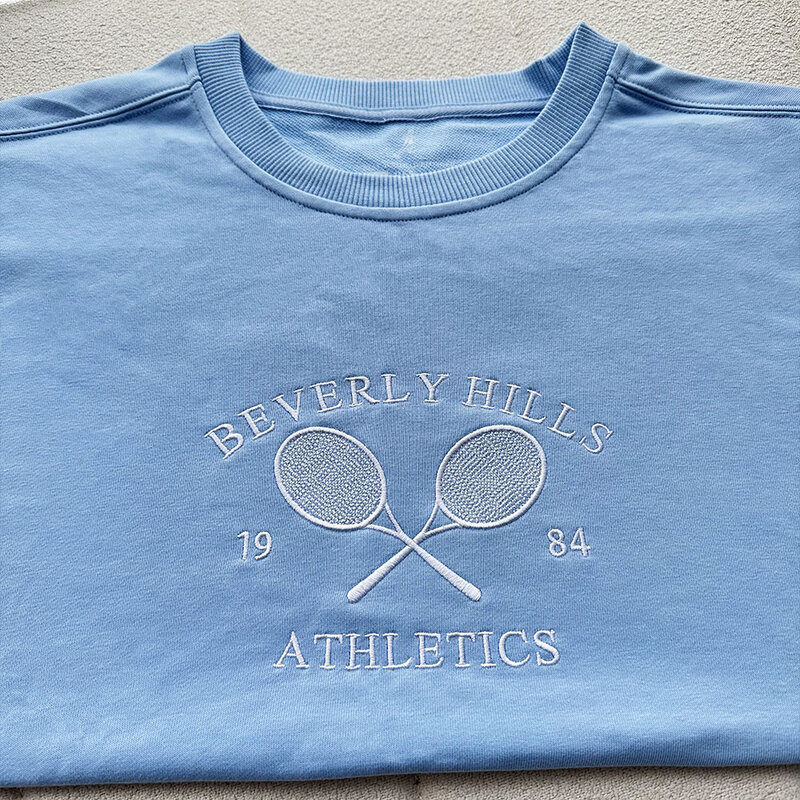 Tenis lekkoatletyka litery haftowane bluzy damskie białe luźna na wiosnę swetry z długim rękawem Retro cienki bawełniane Casual bluzy