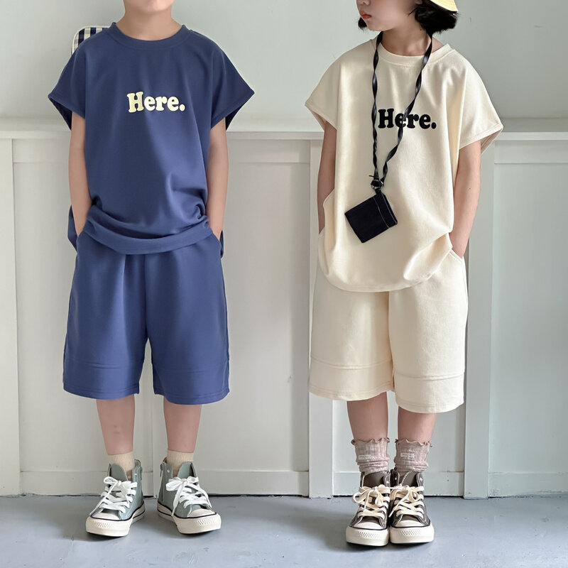 Conjunto de dos piezas de verano para niños y niñas, traje informal de estilo coreano con letras de Color sólido, Top de manga corta y pantalones cortos, 2024