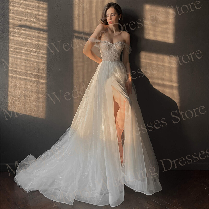 Pełne wdzięku nowoczesne damskie suknie ślubne eleganckie suknie ślubne z koralikami w stylu kochanie seksowne z wysokim wycięciem bocznym فساتين حفلات الزفاف