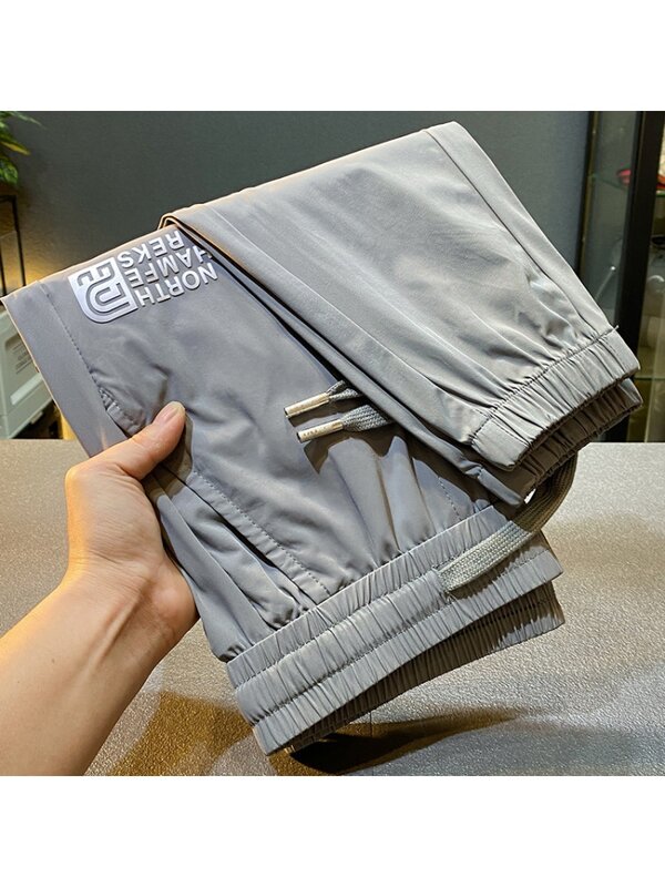Light luxury draping silky casual pants men's summer Thin Ice Silk quick-drying cool cropped sports jogger pants