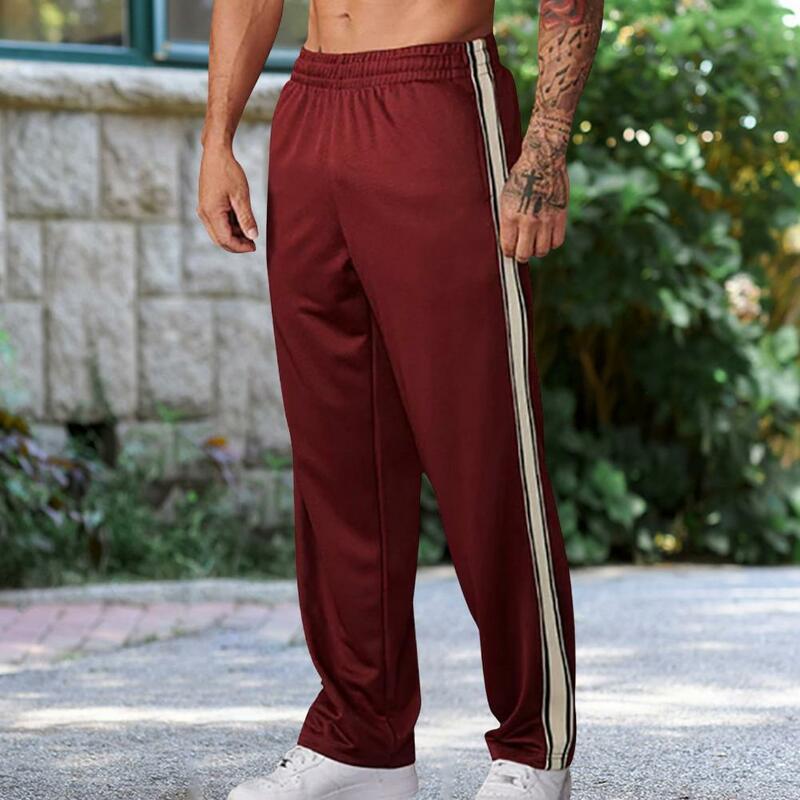 Celana olahraga elastis pria, Bawahan longgar pas badan dengan pinggang elastis Detail garis samping untuk latihan Gym Jogging lembut