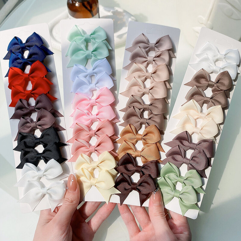 10 pz/set New Solid Ribbon Bowknot fermagli per capelli per neonate fatti a mano simpatici fiocchi forcina mollette copricapo accessori per capelli per bambini