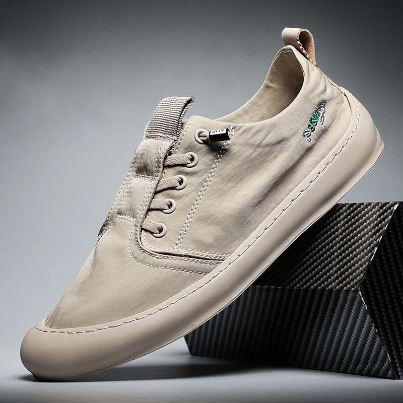 Heren canvas schoenen 2022 zomer nieuwe mode ademend rijden casual luie sneakers all-match antislip sport kleine witte schoenen