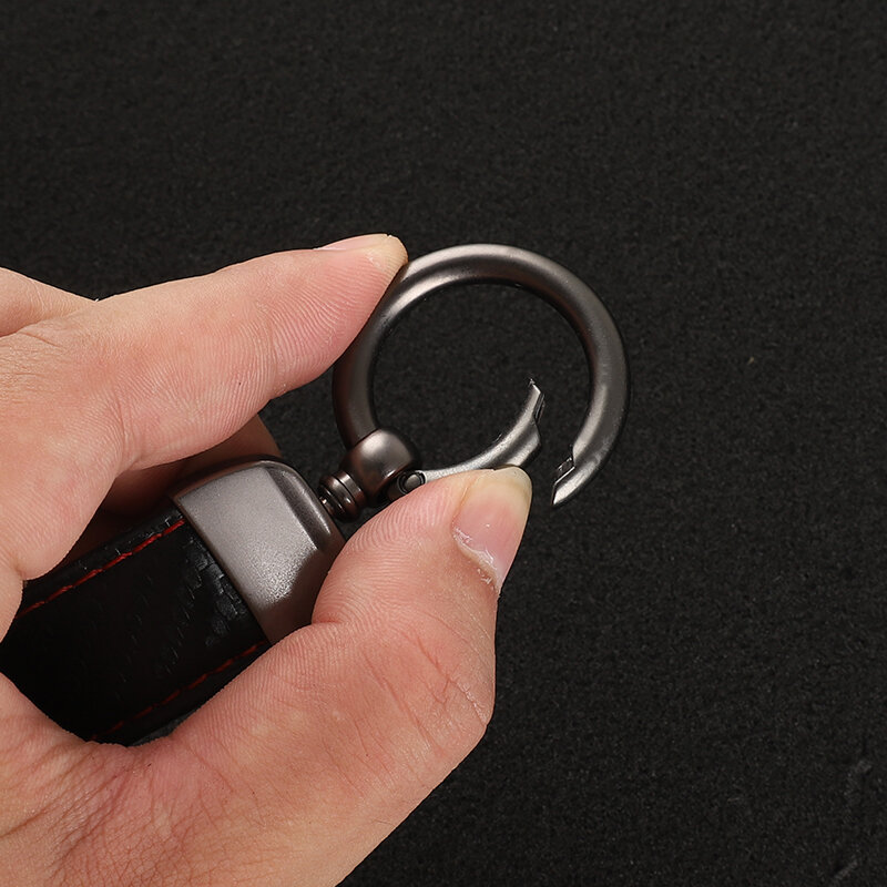 พวงกุญแจรถคาร์บอนไฟเบอร์หนังพวงกุญแจโลหะผสมสังกะสีพวงกุญแจสำหรับ Q5ออดี้อุปกรณ์เสริมรถยนต์โลโก้