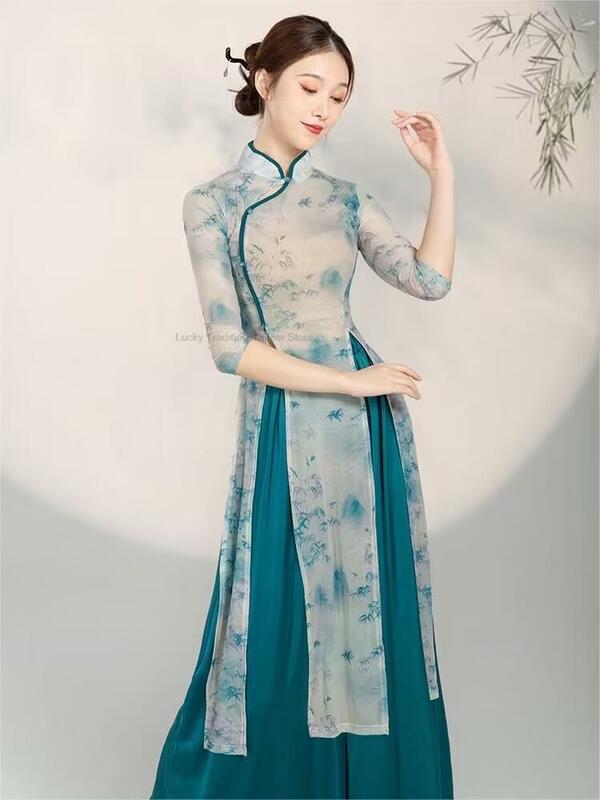 Gaun Qipao tradisional Cina + celana Set panggung kinerja Vintage kostum tari rakyat wanita bunga cetak Mesh tari Qipao