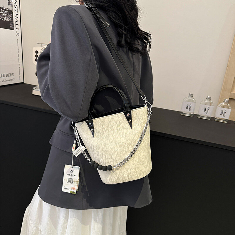 Tas Bucket wanita tas selempang bahu tunggal rantai perempuan fashion baru musim panas tas jinjing desainer komuter kasual