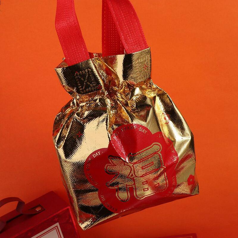 กระเป๋าใส่ขนมแบบพับได้อุปกรณ์เสริมสำหรับจัดเก็บถุงซานตาเชือกดึงแบบพกพาเป็นมิตรกับสิ่งแวดล้อมมาสคาร่า