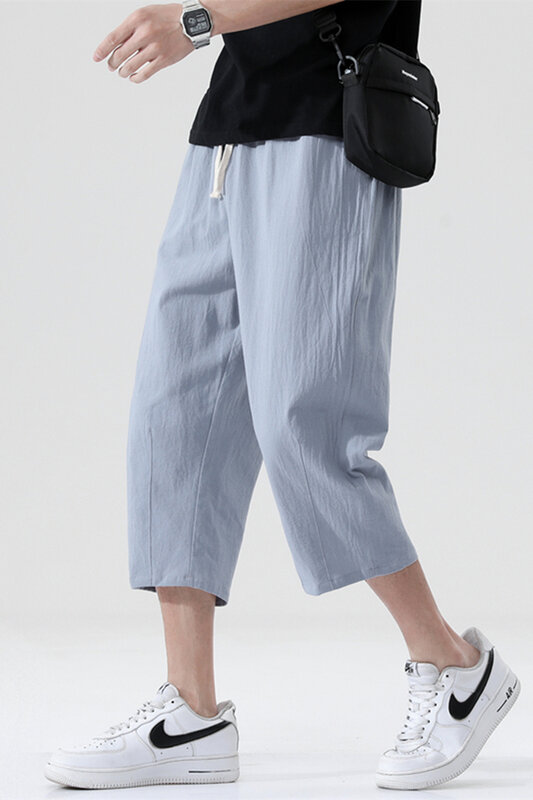 Calças casuais de verão, calças de algodão e linho soltas para homens, estilo coreano, calças retas de três pontos