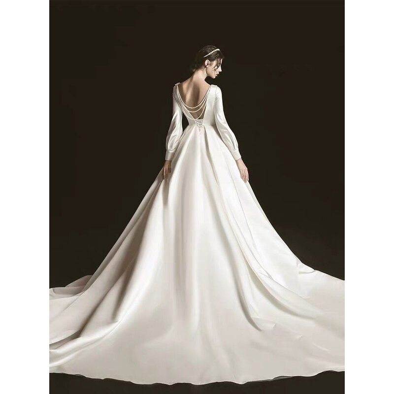 Gaun pengantin wanita, vestidos de novia de satin elegan Backless mutiara gaun pernikahan lengan Penuh buatan khusus