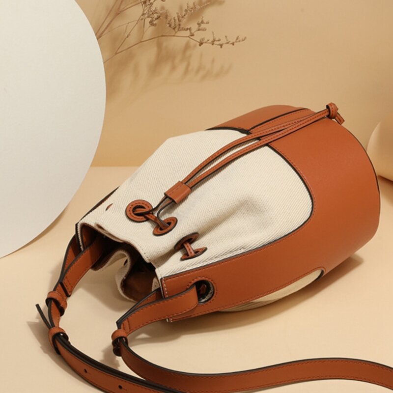 Bolso de cubo de cuero para mujer, bolso de hombro antirrobo, bolso de viaje de diseñador con cordón