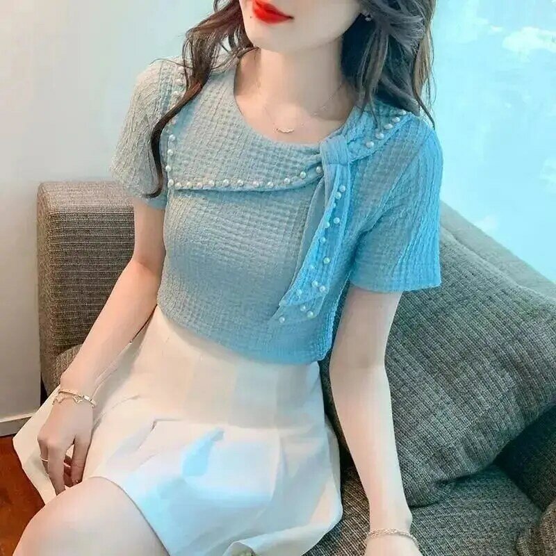 Dolce o-collo impiombato tinta unita Lace Up perline t-Shirt abbigliamento donna 2024 estate nuovi top Casual larghi maglietta coreana