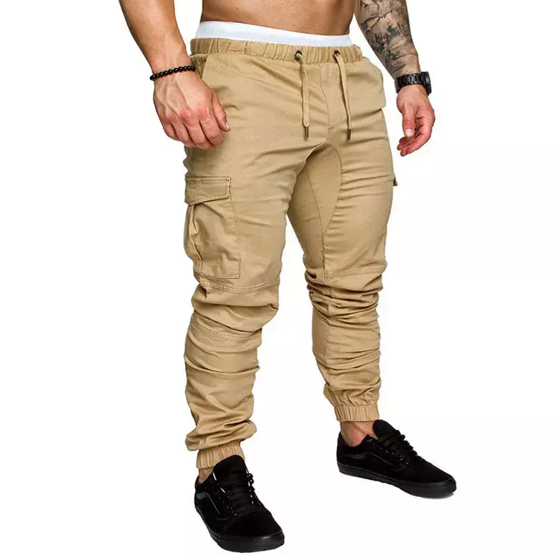 Celana joging pria, bawahan katun pinggang elastis kasual warna Solid banyak saku untuk lelaki