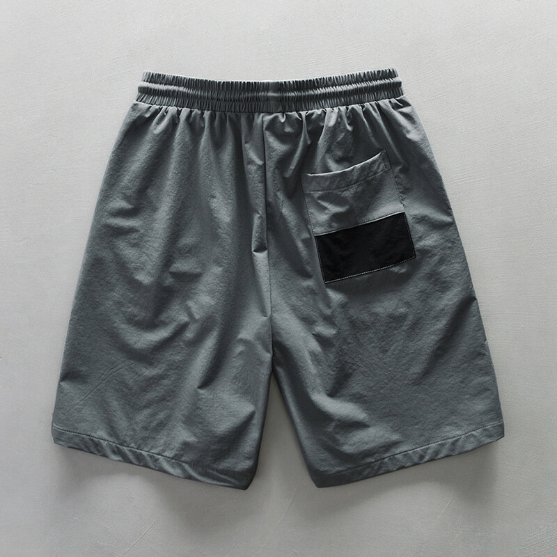 Pantalones cortos informales para hombre, ropa masculina holgada de retales con cordón, bolsillos grandes, AZ840-1, novedad de verano 2024