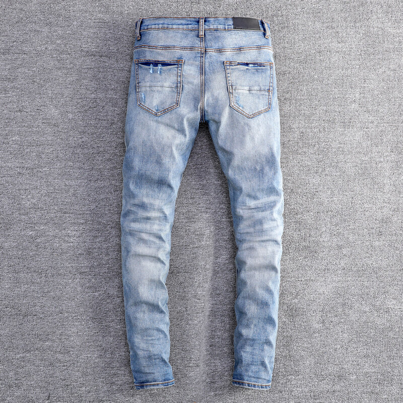 Jeans de couro retrô azul magro rasgado masculino, calça designer remendada, marca hip-hop, moda de rua alta