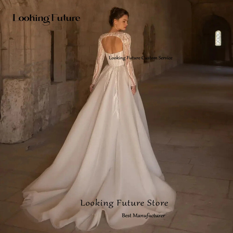Luksusowa peleryna 2 w 1 biała suknia ślubna aplikacje z koralikami seksowne bez pleców, długa rękawy suknia ślubna kochanie pociąg