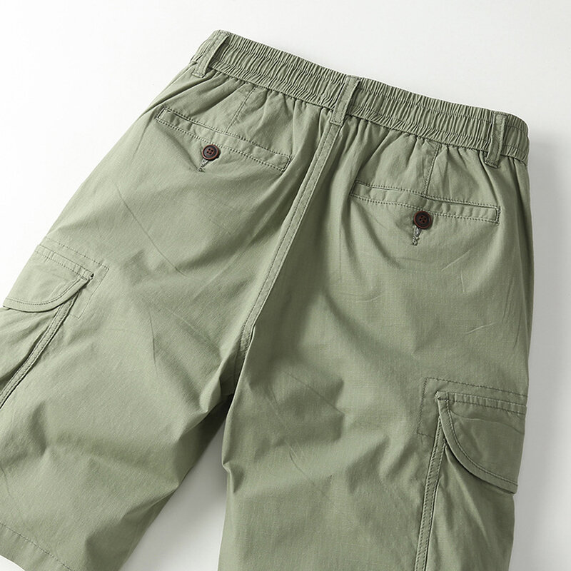 Calção casual masculino de carga, monocromático, elástico na cintura, calça curta, moda masculina, fundo verde, verão