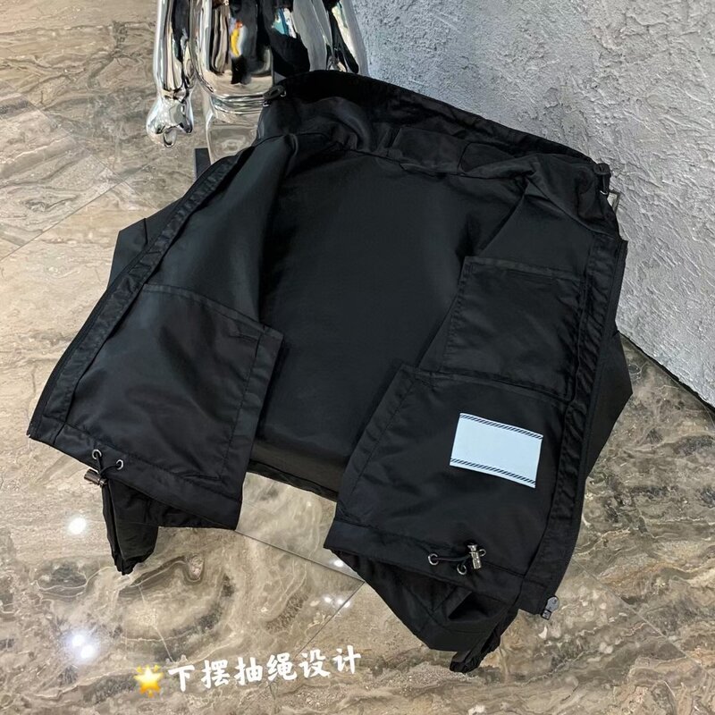Spring and summer woman nylon short jacket Hooded Solid color Leisure coat Unique triangular logo Wearing it legs are long