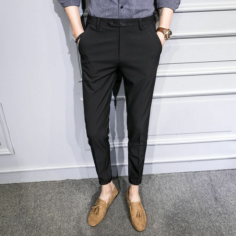Calça lápis fina coreana da moda masculina, patchwork xadrez estampado, bolso de botão, casual inteligente, calça reta versátil, primavera