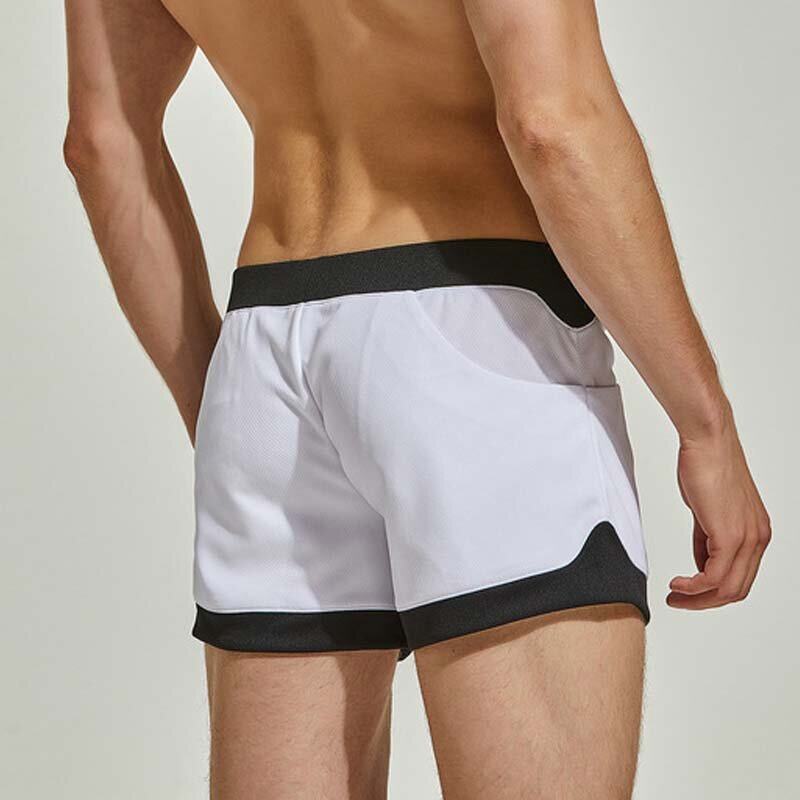 Pantalones cortos de Aro para hombre, ropa interior Sexy con bolsa para pene, cómoda y suelta