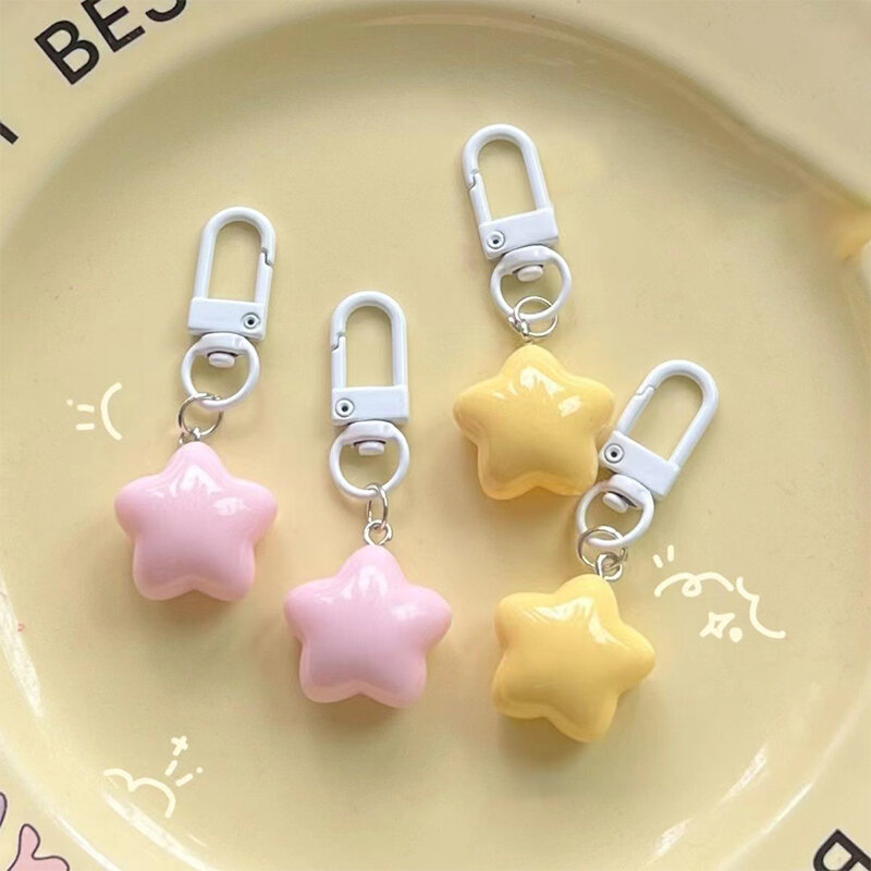 女の子のための星の形をしたキーホルダー,ペンダント付きのかわいいアクセサリー,黄色いピンク,1ユニット