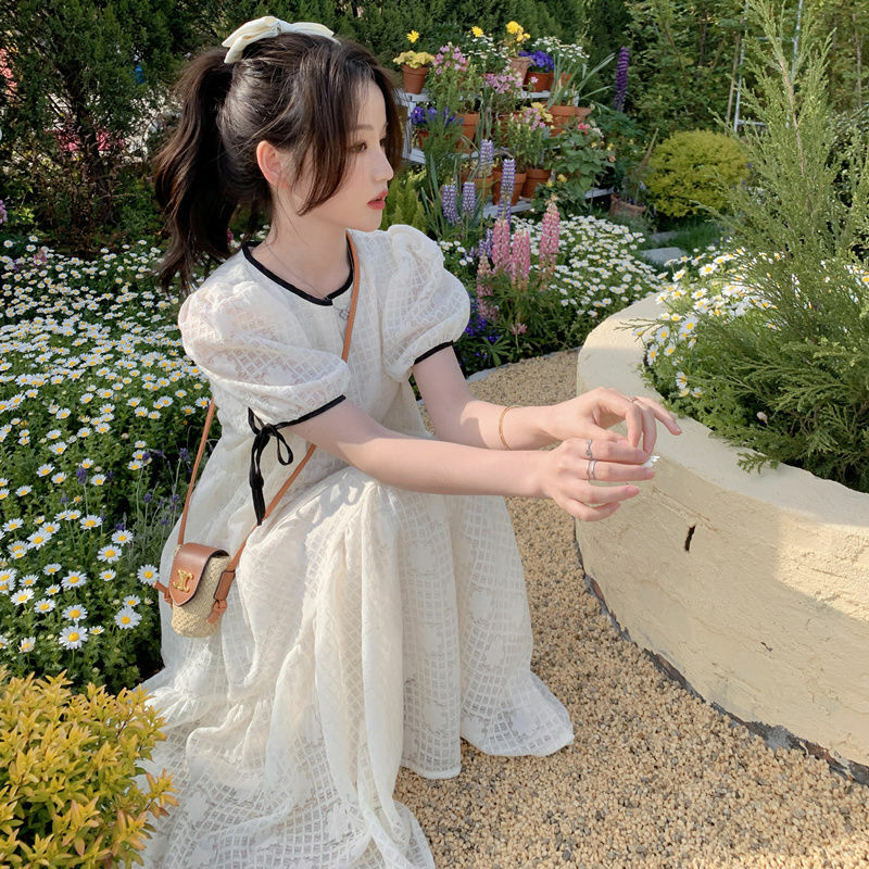 Słodka sukienka księżniczki z okrągłym dekoltem i bufiaste rękawy z kokardą odzież damska 2024 letnia nowa luźna koreańska sukienka Midi w jednolitym kolorze