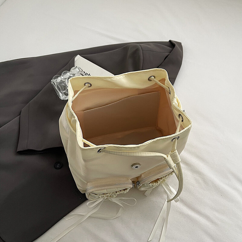 Женские маленькие нейлоновые рюкзаки с бантом, модель 2024 года, весенний модный однотонный рюкзак в Корейском стиле Y2K, женские дорожные простые рюкзаки