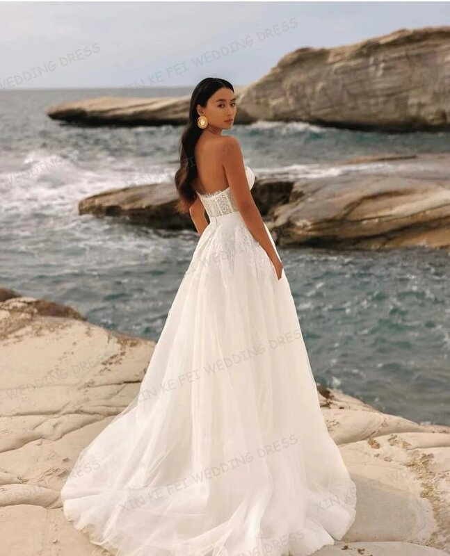 2024 Luxury Wedding Dresses Women's A-Line Sexy Sleeveless Lace Appliques Backless Tulle Sweep Train Bridal Gowns Vestidos Novia
