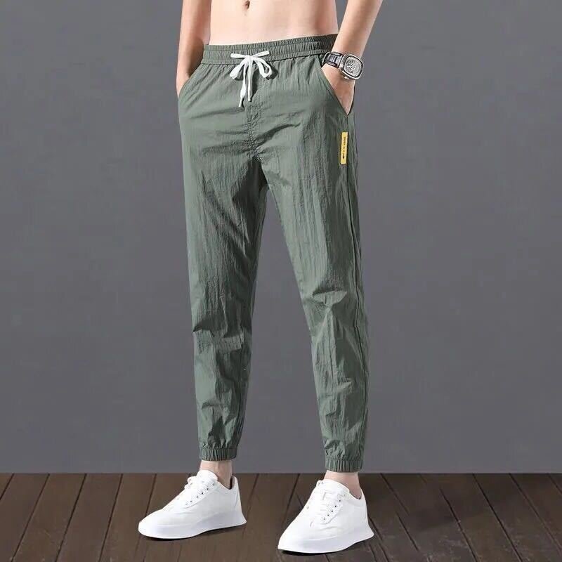 Gelo de seda masculina verão coreano moda calças soltas nove pontos clássico drawstring elástico na cintura jogging