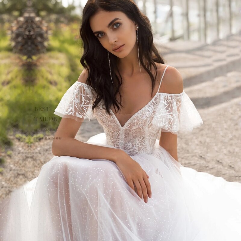 Elegant Glitter Tulle A-Line Wedding Gown with Cold Shoulder Lace Bodice Floor-Length Skirt for Modern Fairy-Tale Bridal Look