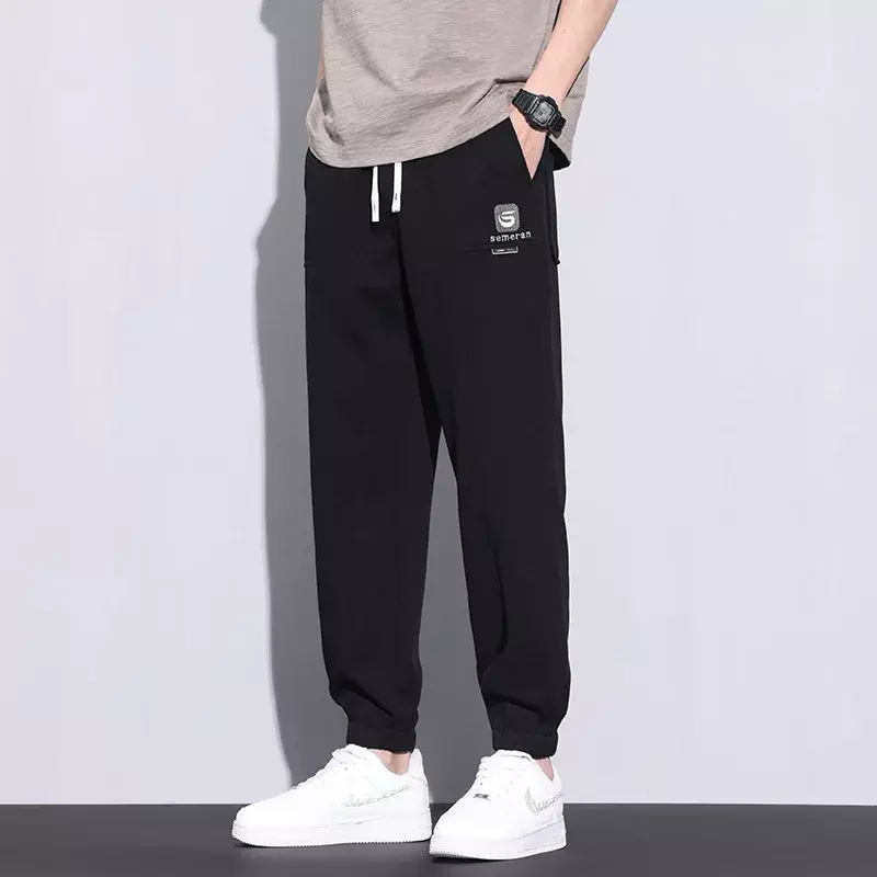 Pantaloni da uomo di nuovo arrivo Streetwear abbigliamento da uomo pantaloni Cargo pantaloni da uomo di tendenza Casual moda coreana Streetwear coreano da uomo