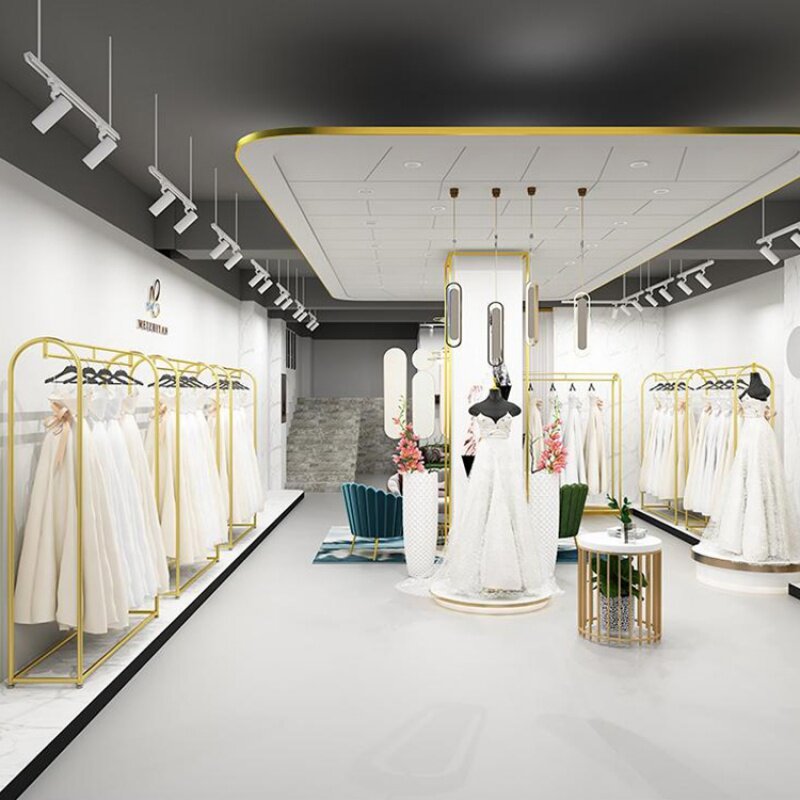 Estante de exhibición de ropa de boutique, nuevo diseño personalizado, dorado