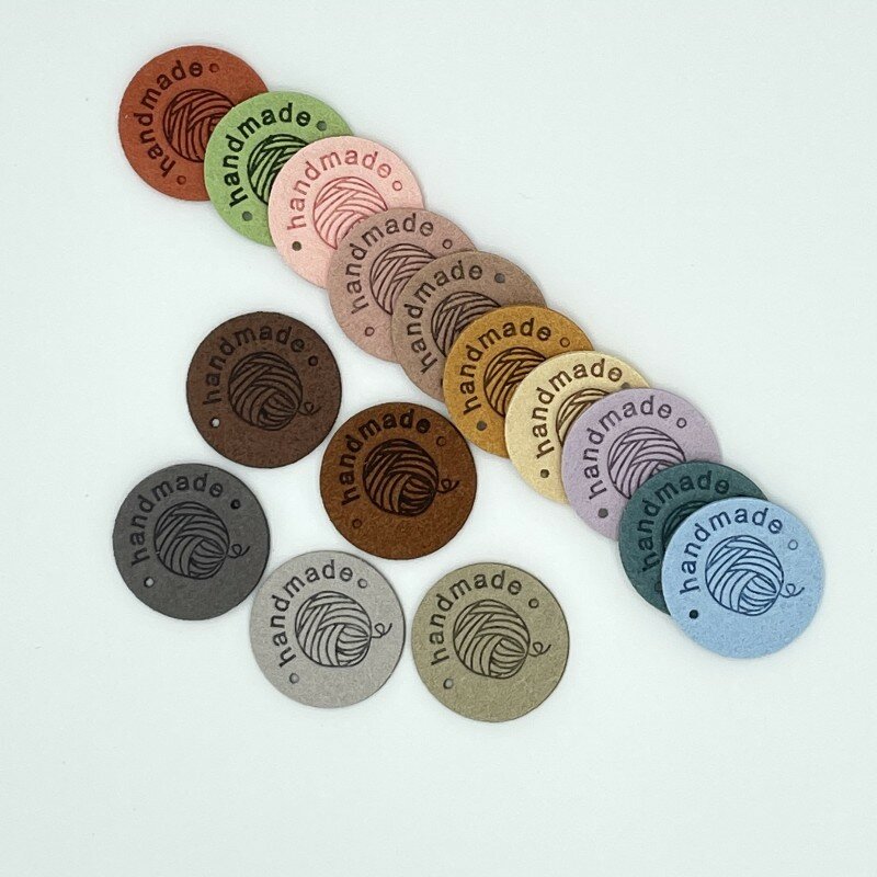 100 PCs Round Label Tags Ball of Yarn Handmade Faux Suede Embossed Clothing Labels Sewing Hat Supplies Garment Knitting Tag 25mm