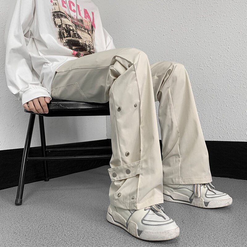 Celana kargo pria trendi muda populer musim panas desain kancing warna Solid Streetwear gaya Amerika remaja celana panjang longgar Chic