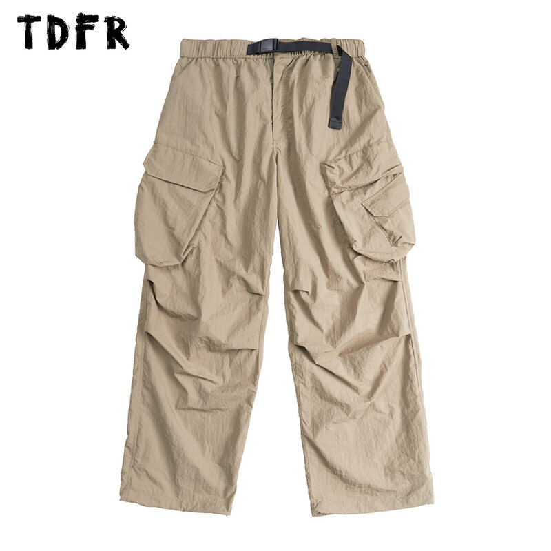 Kieszonkowe spodnie Cargo luźne męskie styl Safari jednolity kolor regulowane elastyczne talii spodnie z szerokimi nogawkami mężczyzn