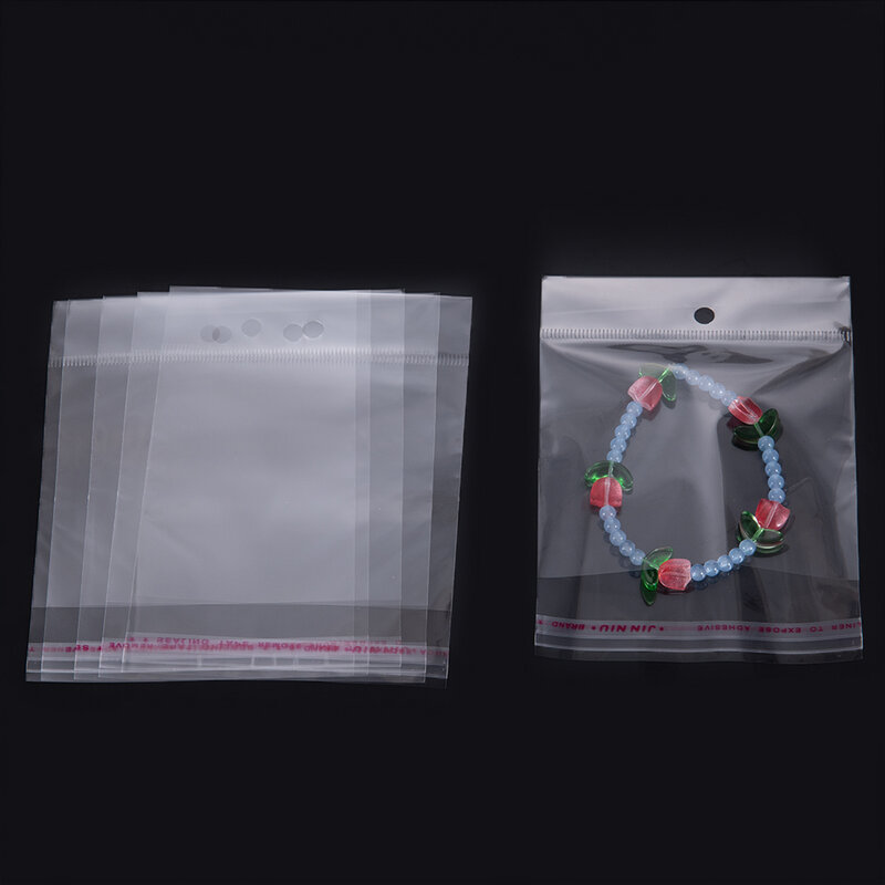 Bolsas transparentes de plástico con orificio para colgar, autosellantes de 50/100 piezas, para joyería, embalaje al por menor, dulces y galletas