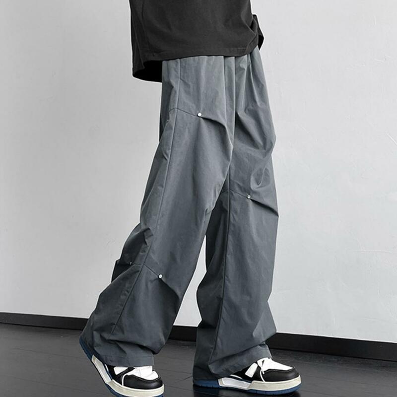 Męskie spodnie Cargo ozdoby z nitów Hip Hop szerokie proste luźne boczne kieszenie spodnie dresowe wodoodporne spodnie długa na świeże powietrze