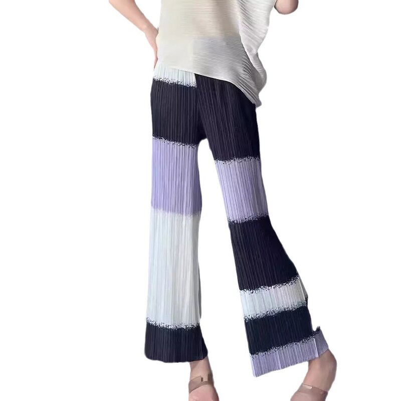 Плиссированные простые темпераментные повседневные брюки Miyake с цветным блокировкой, свободные узкие модные женские брюки для девяти минут, лето 2024