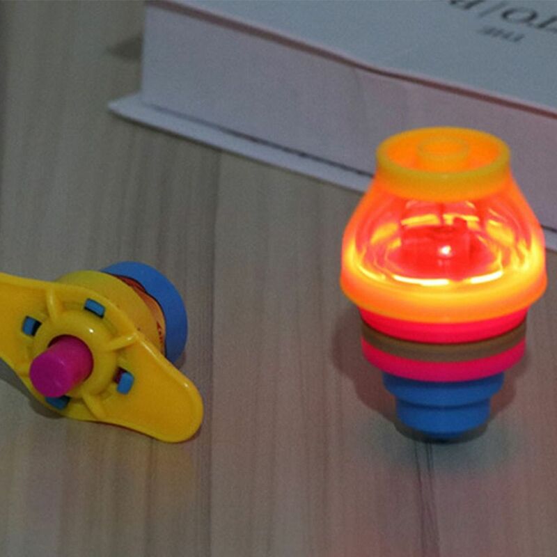ของเล่นนำสะท้อนแสงแอลอีดีของเล่นลูกข่างไฟฟ้าของเล่นหมุนรอบแบบหมุนได้ของเล่นแบบหมุนได้ลูกข่าง