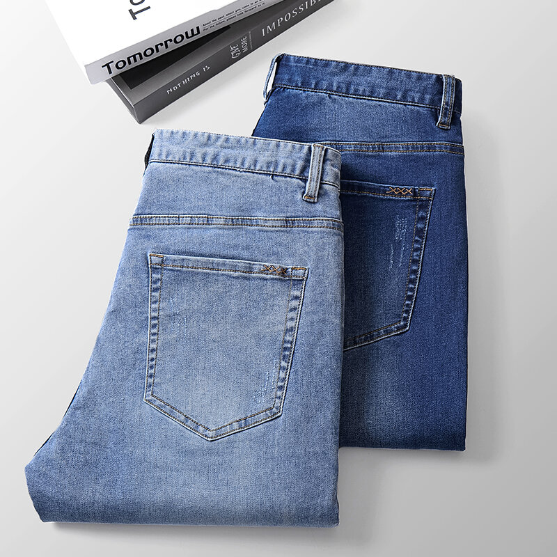 กางเกงยีนส์ลำลองธุรกิจขนาดใหญ่สำหรับผู้ชายกางเกงยีนส์กางเกงผู้ชายขาสามส่วนยืดทรงหลวมแฟชั่นสีฟ้า