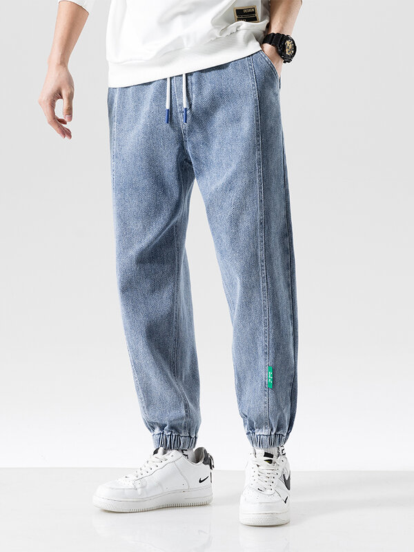 Wiosna lato czarny niebieski workowate dżinsy mężczyźni Streetwear Denim biegaczy dorywczo bawełniane spodnie Harem spodnie Jean Plus rozmiar 6XL 7XL 8XL