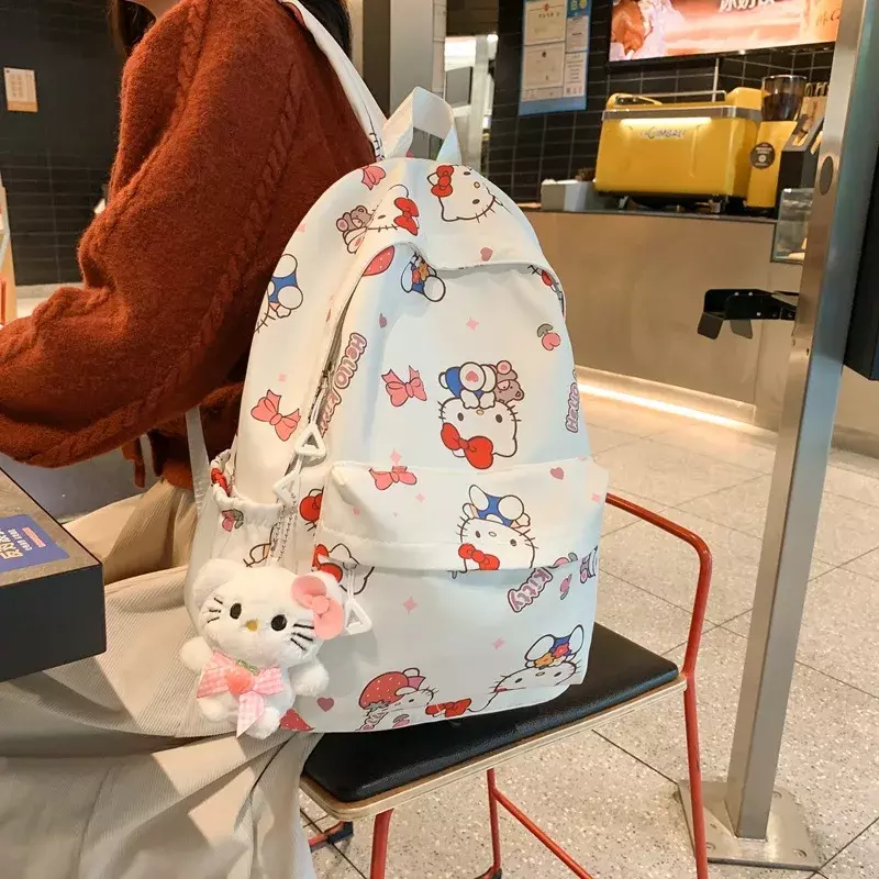 حقيبة ظهر مقاومة للماء من Hello Kitty ، موجة فرشاة للطلاب ، حقيبة مدرسية متعددة الاستخدامات من Sanrio ، جرافيتي للفتيات