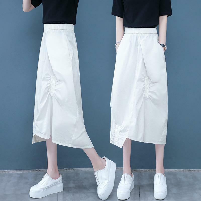 Fashion Elastic Spliced Folds Asymmetrical Skirts Women's Clothing 2024 Summer New Loose Solid Color Irregular Casual Skirts