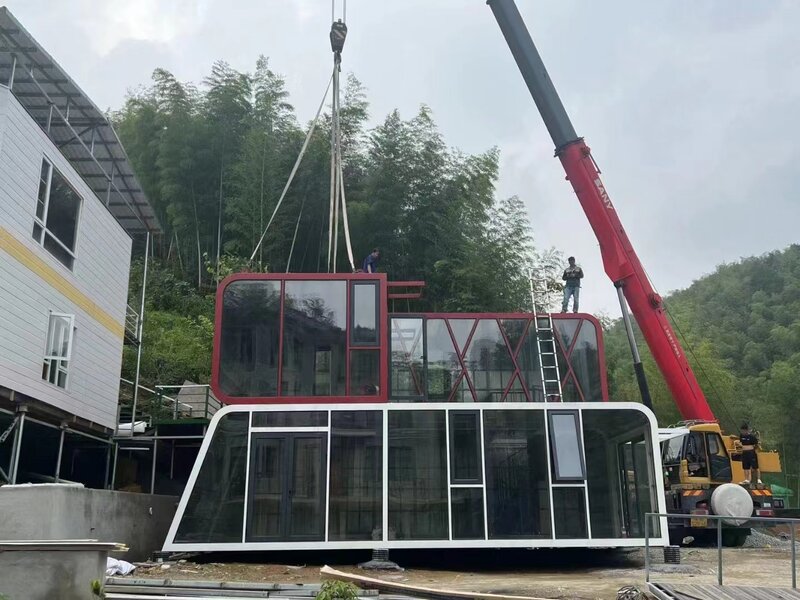 Casa del contenitore della cabina della capsula dello spazio costruita in fabbrica, cabina prefabbricata mobile home building modulare