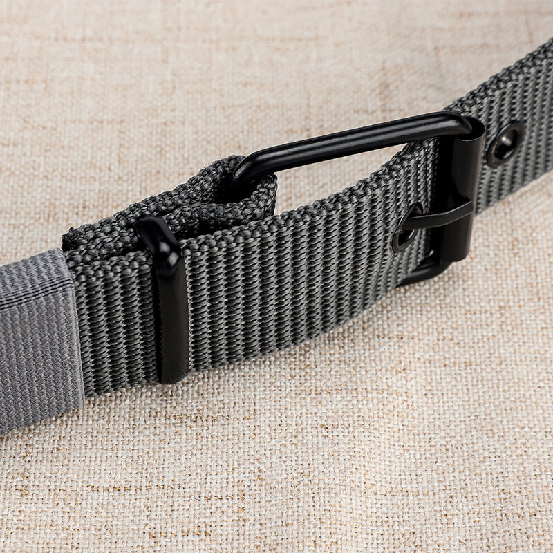 Cinturón de lona perforado con hebilla de aguja para hombre, versión coreana para estudiantes jóvenes, cinturón versátil para jeans, entrenamiento militar, extensión