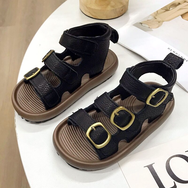 Sepatu bot pendek anak wanita, sandal modis kulit asli polos Gladiator sepatu musim panas untuk anak-anak krem cokelat hitam kasual