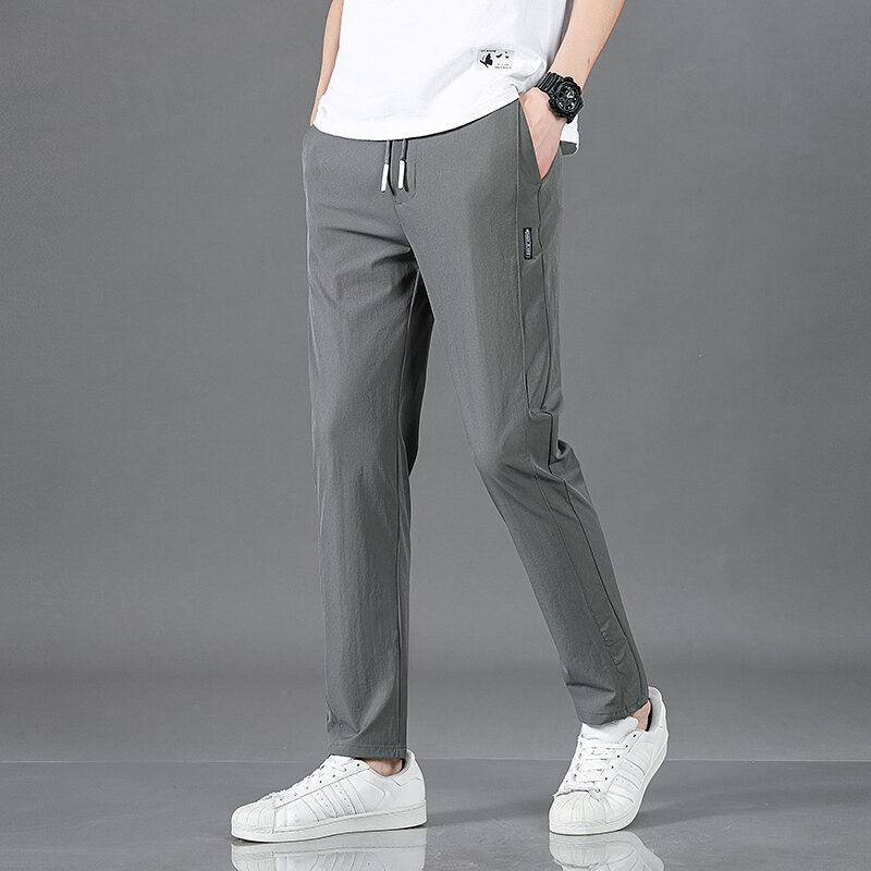 2024 New Summer Men's Straight Pants Quick Dry Elastic Thin Section Sports Pants Loose Breathable Solid Color Casual Pants M-5XL
