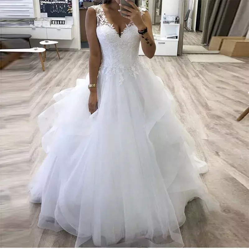Gaun pernikahan putih a-line anggun rok Tulle berjenjang Puffy tanpa lengan panjang lantai gaun pengantin pantai romantis