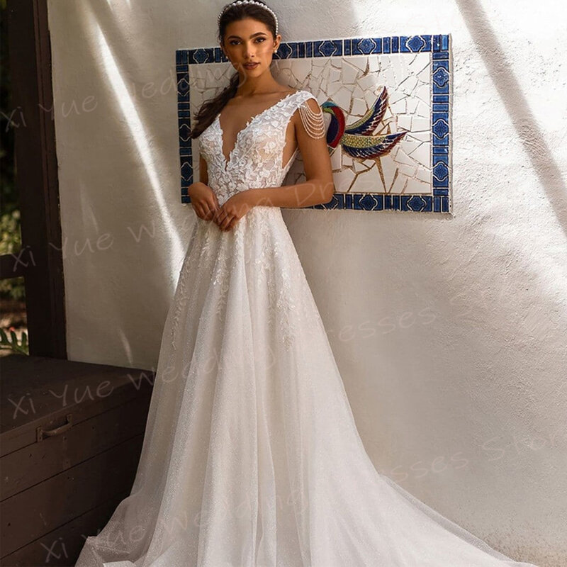 Fascynujące dekolt w szpic damskie suknie ślubne nowoczesne koronkowe aplikacje suknie panny młodej bez rękawów bez pleców Vestido De Noivas