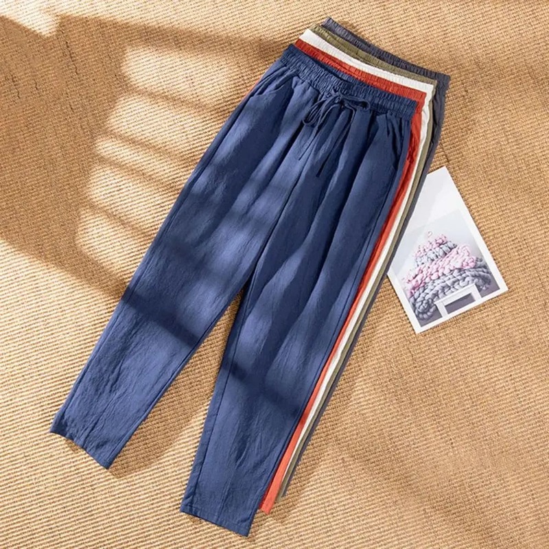 Casualowe spodnie stylowe damskie w jednolitym kolorze spodnie haremowe z elastyczne kieszenie w pasie casualowym sznurkiem ze ściągaczem do Streetwear