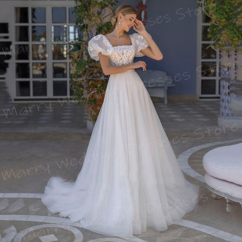 Romantyczne urocze damskie suknie ślubne z wdziękiem aplikacje koronkowe nowe kwadratowy kołnierzyk suknie ślubne na guziki Mariage Femme